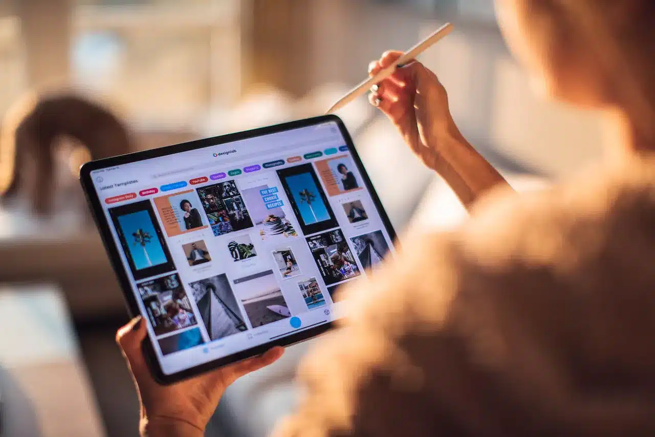 a woman browsing a website on a tablet